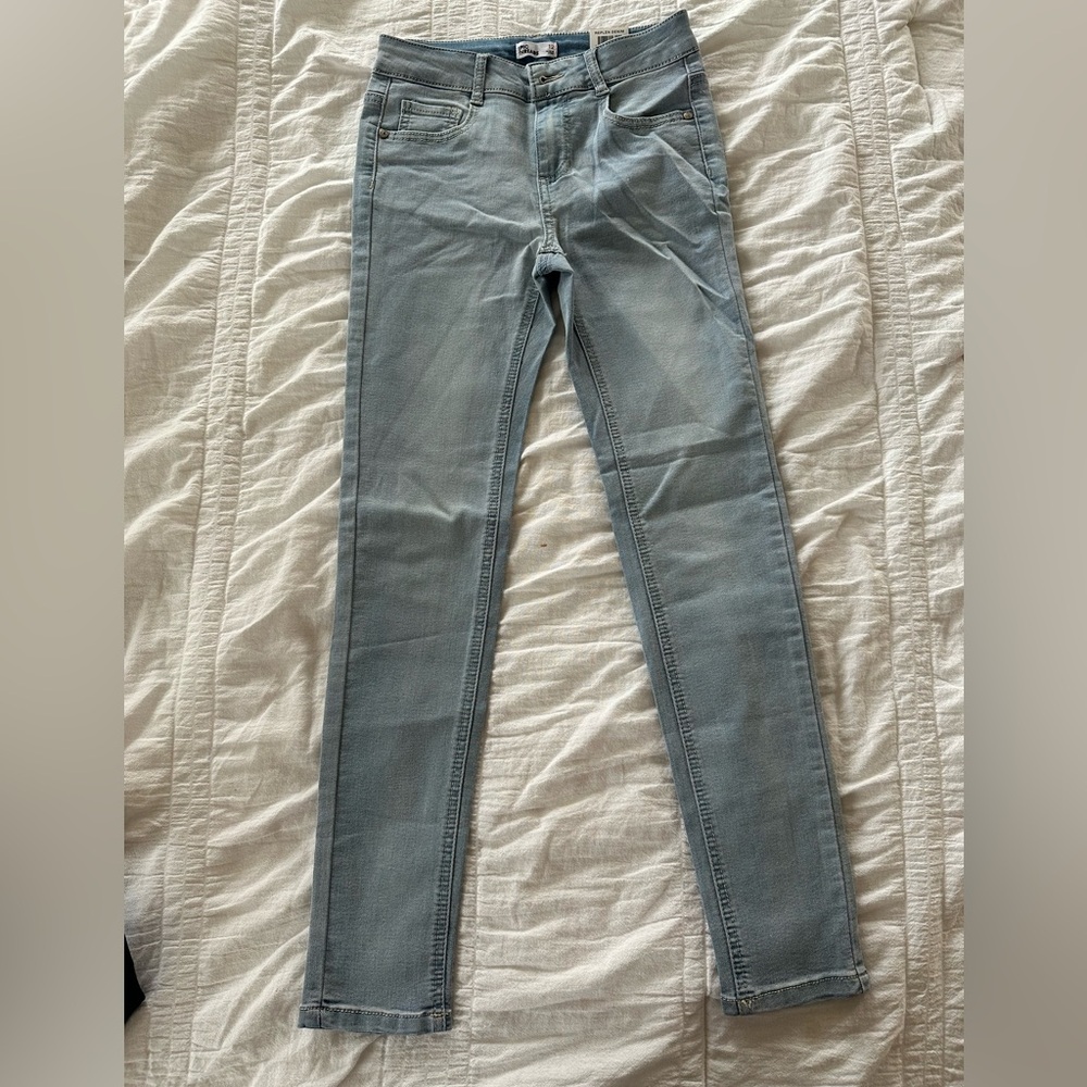 Epic threads girls skinny jeans. New with tags. Girls size 12. Light wash.